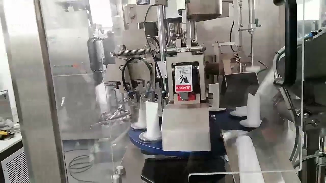 Fully Automatic Tube Filling & Sealing Machine | GMP Certified | High Speed & Precision | Sinopek