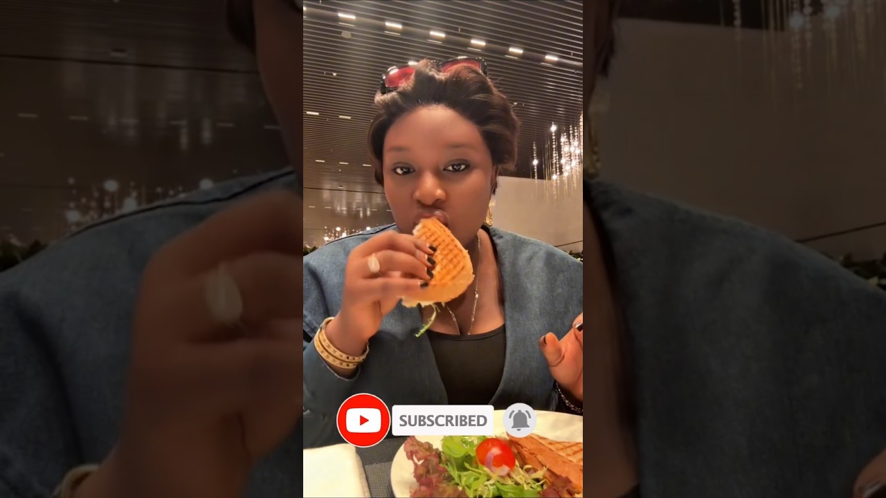 Watch what Bimpe Oyebade was caught doing on a flight to United State without her husband 
