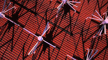 Aerial view of the Murchison Widefield Array (MWA): hovering low over antenna tile and climbing