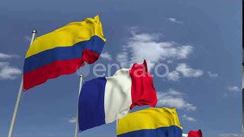 Flags of Colombia and France Against Blue Sky | Motion Graphics - Envato elements