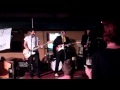 Izzy & the Catastrophics performing live outdoors at the Celtic Ray in Punta Gorda