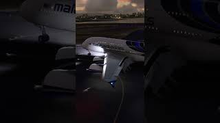 Title: Malaysia Airlines A380 Makes Nighttime Landing on Haneda Airport Runway 22