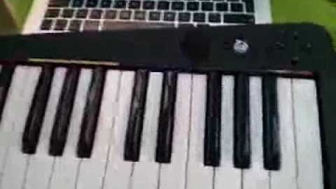 Rock Band keyboard sending wireless MIDI to OSX