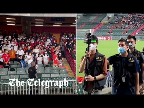 Hong kong football fans boo china's national anthem at first match since security bill enacted