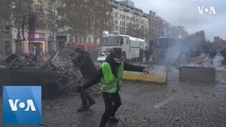 Police Turn Tear Gas, Water on French Fuel-Tax Protest