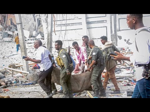 Explosions rock somalia's capital mogadishu, at least 100 killed