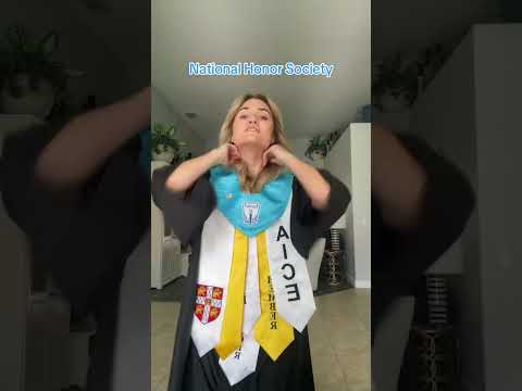 Girl Is Showing Each Core Stole And Medals That She Received As Graduation Honors 