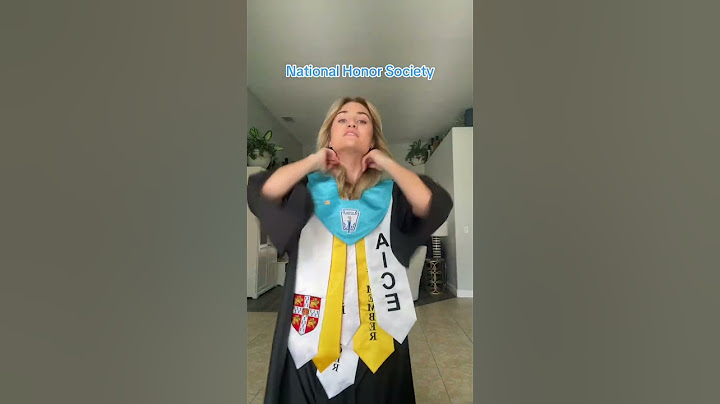 Girl is showing each core, stole, and medals that she received as graduation honors!
