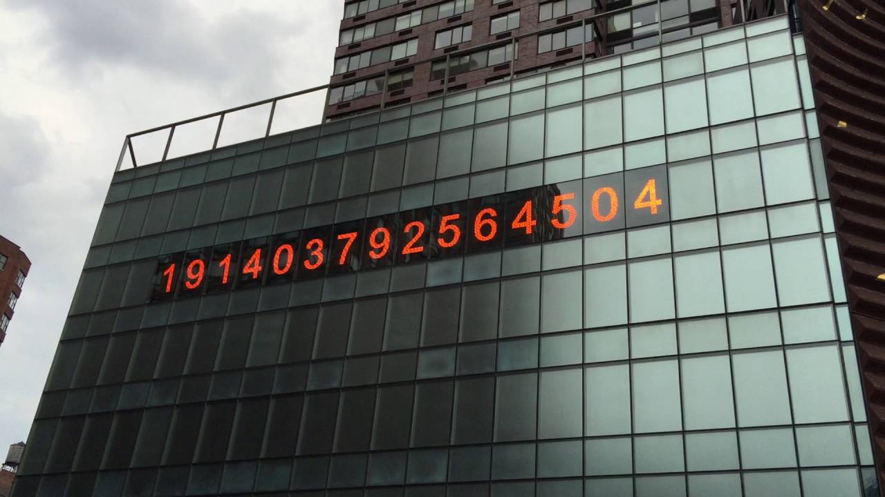 QUICK GLIMPSE OF A GIANT UNITED STATES MILITARTY CLOCK ON 14TH ST. IN