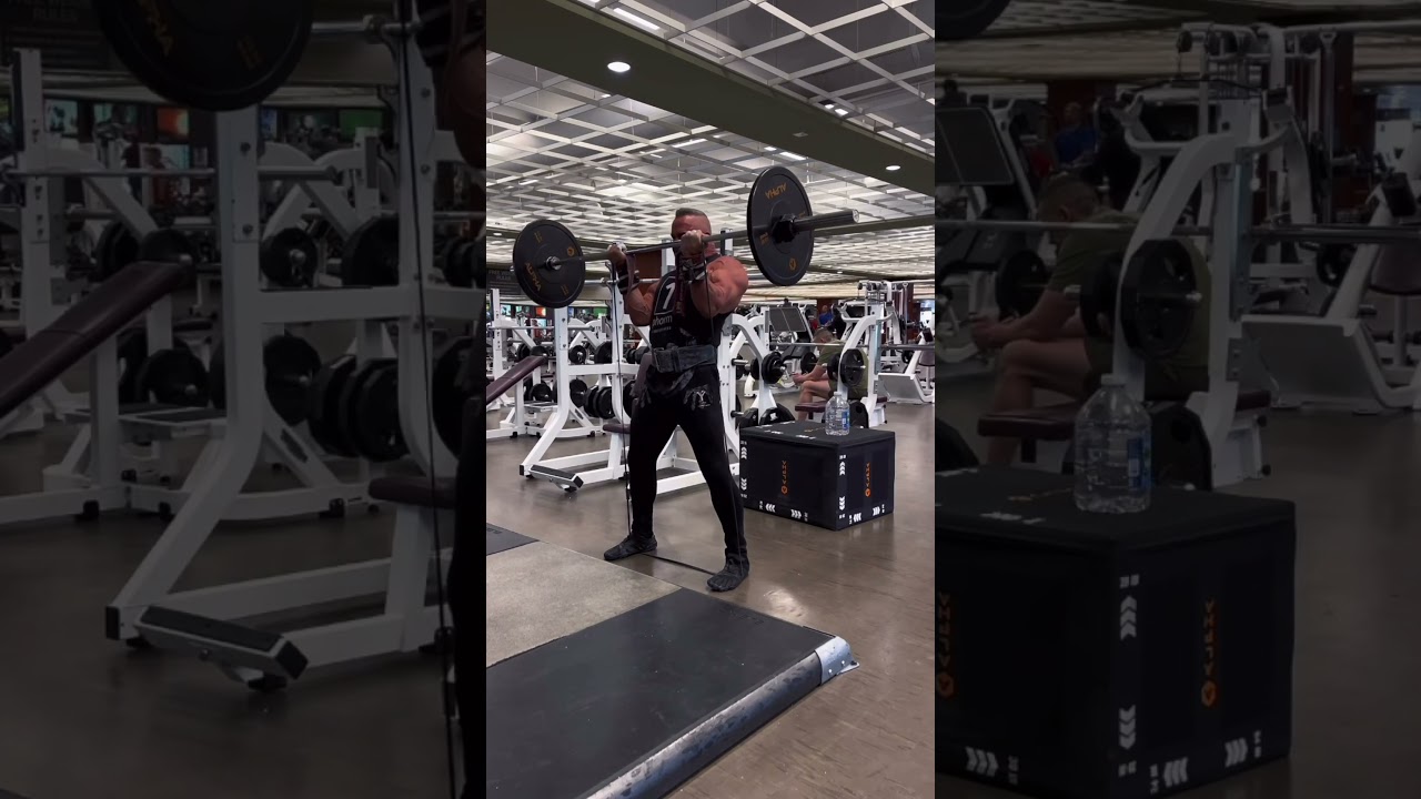 Barbell curls using a resistance band as extra resistance is a great way to accentuate the eccentric
