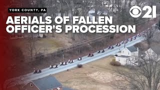 Drone shots of fallen officer's procession; first responders pay tribute