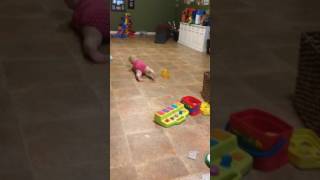 Grace learning to crawl, nine months, 2015