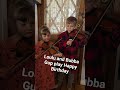 Loulu and Bradley fiddle happy birthday