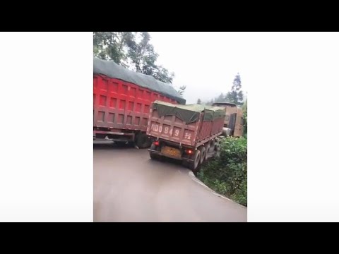 Steep and muddy mountain roads are a severe test for truck drivers