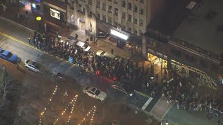 Fireworks in the streets as protesters march in downtown Durham