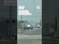 Wildfire haze from Canada lingers over railroad tracks in Norfolk