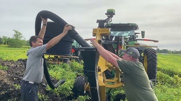 See what it takes to tile a farm field and hop in the cab to see setup steps for Soil Max tile plow