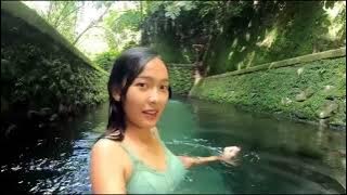 Rumas alvia mandi disaluran irigasi yang bening