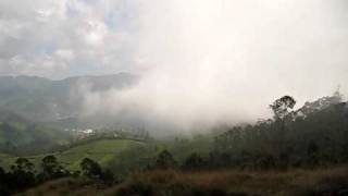 enjoying the view of hills and teas plantations in Munnar India