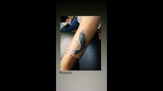 Feather Cover-Up Tattoo