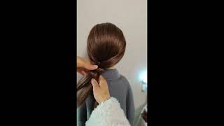 Sleek and Full Braided Bun: Perfect Headache-Free Hairstyle