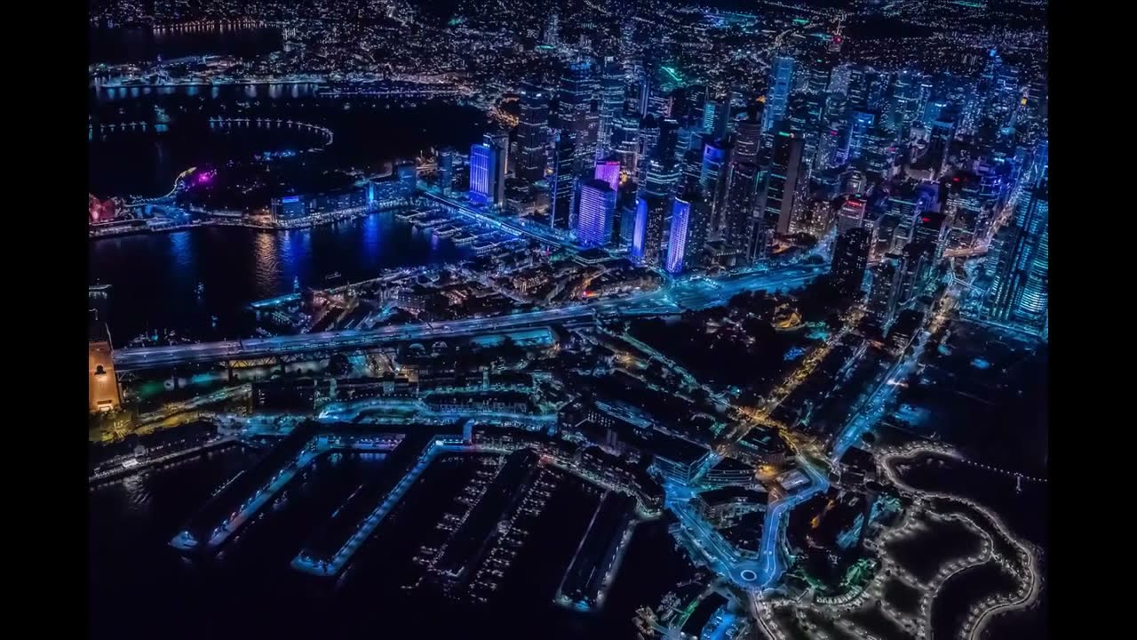 Sydney Photographer Gary Compton shoots from helicopter during Sydney Vivid Festival 