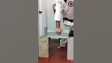 Breaking cement blocks