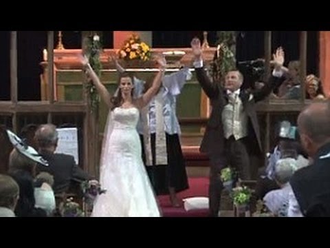 English couple uses flash mob surprise during church wedding