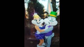 bugs bunny and lola bunny wear purple outfits