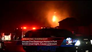 High flames destroy a home in Fort Smith