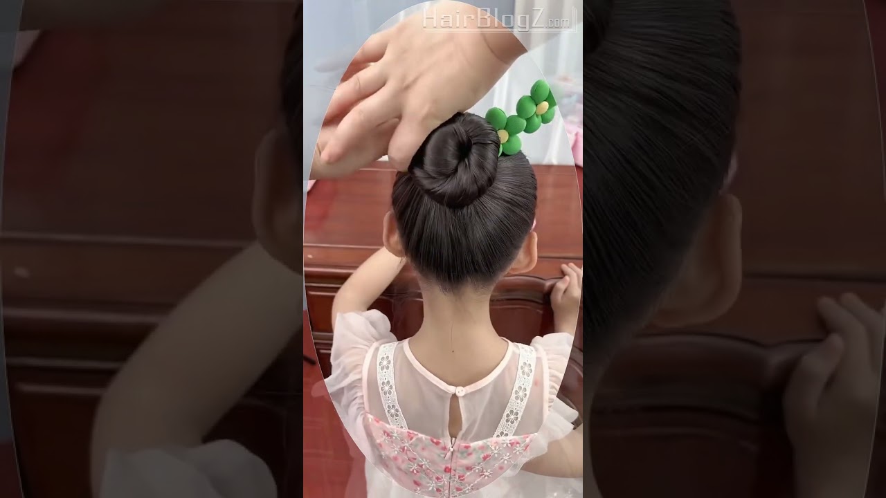 Charming Twisted Bun with Floral Accent: A Step-by-Step Guide