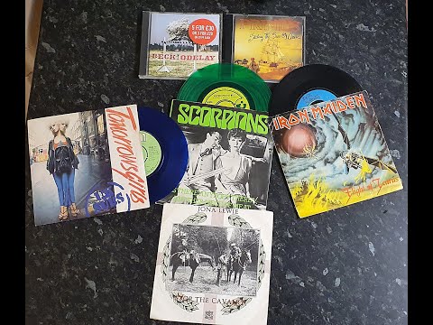 A fruity lager (?), Primus, Beck, rock/thrash 7"s, 3 Dead Man's fingers, Subhumans, Doom & Contempt