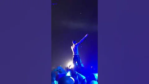 Wizkid fan falls him down on stage