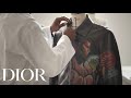 Hand-painting brings literature to leather for Dior men's Fall 2022