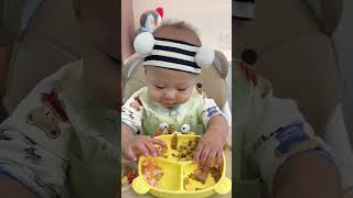 11-month-old baby tries new food for first time 😂 #cute-baby-foodie #eating-baby #foodie-life