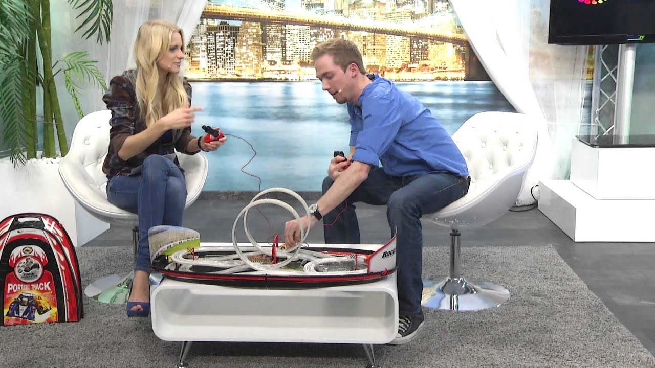 Playtastic Portable Rennbahn im Koffer mit Looping & Handkurbel