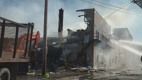 Crews clear charred remains of Houlton apartment b...