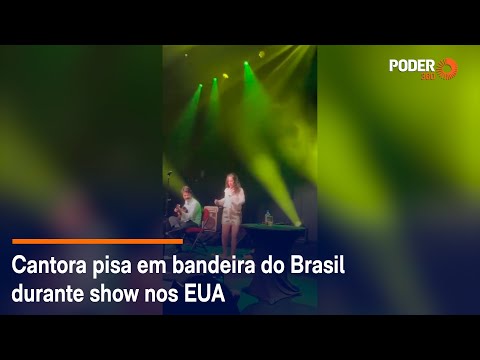 Cantora pisa em bandeira do Brasil durante show nos EUA