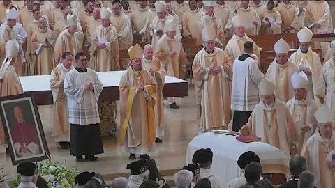 Hundreds gather for funeral service of Bishop Davi...