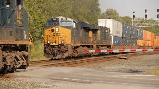 CSX intermodal trains pass in front of camera at the same time! ES44's with different horns!
