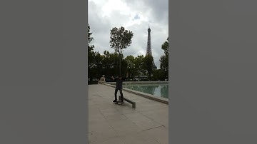 A boardslide in Paris "behind the eiffel tower"