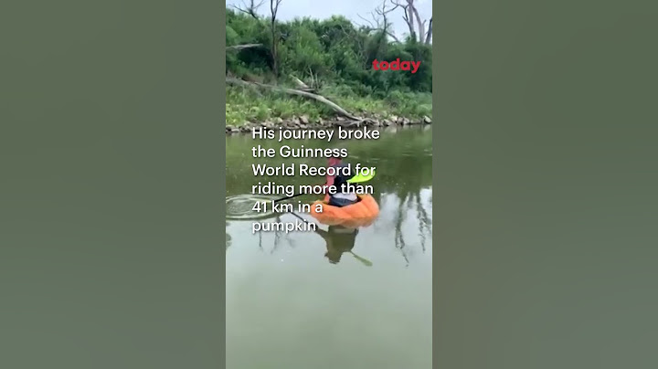 Man paddles 61km in giant pumpkin to break world record