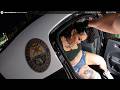 Woman Tries to Open a Police Car 20 Times — Officers Step In