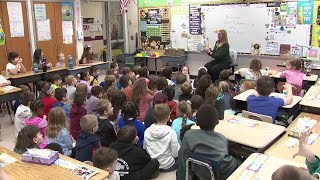 Newswatch 16's Emily Kress reads to students in Monroe County