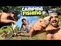 Camping near river  catch and cook in forest with bow