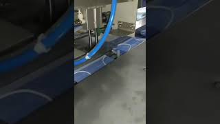 Mask ear loop folding and automatic packing machine