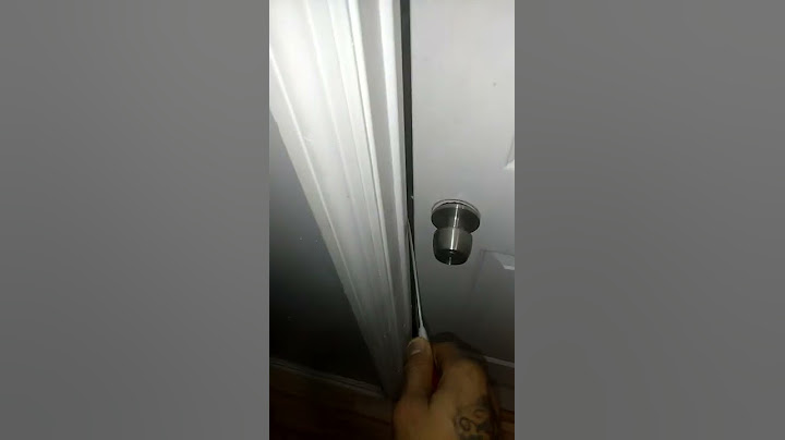 How to pop a door lock with a screwdriver or butter knife.