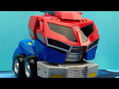 OPTIMUS PRIME TRANSFORMERS ANIMATED COMMAND AND ROLL OUT SUPREME CLASS VIDEO