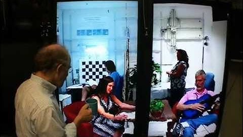 Kinect-based Telepresence with Room-Sized Real-Time 3D Capture and Life-Sized Tracked Display