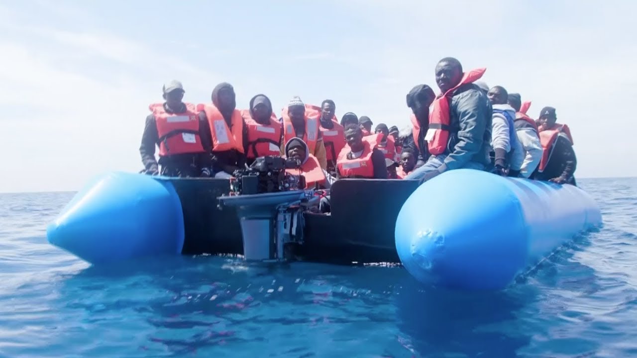 German NGO ship rescues 64 people in the Mediterranean - YouTube